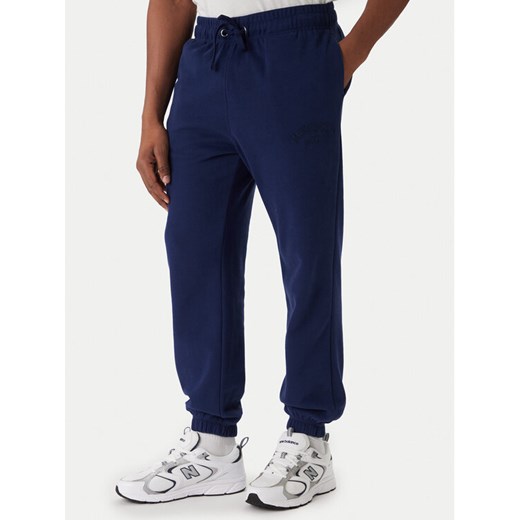Jack & Jones Spodnie dresowe Kane Bleecker 12287165 Niebieski Relaxed Fit ze sklepu MODIVO w kategorii Spodnie męskie - zdjęcie 187516439