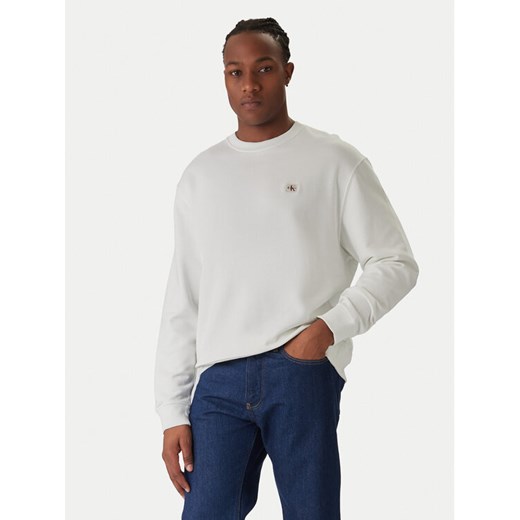 Calvin Klein Jeans Bluza LV04RC273G Biały Regular Fit ze sklepu MODIVO w kategorii Bluzy męskie - zdjęcie 187535967