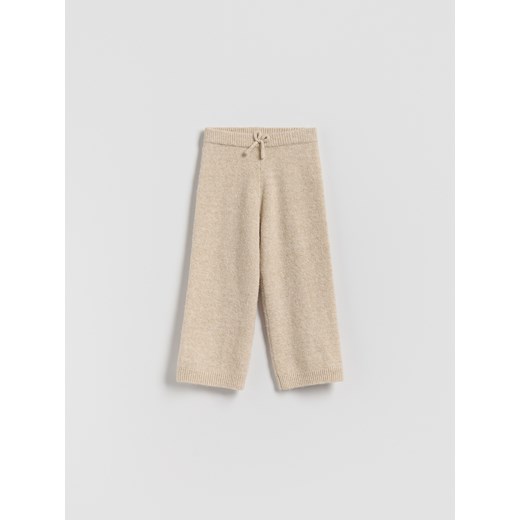 Reserved - Dzianinowe spodnie - beżowy ze sklepu Reserved w kategorii Spodnie dziewczęce - zdjęcie 187536459