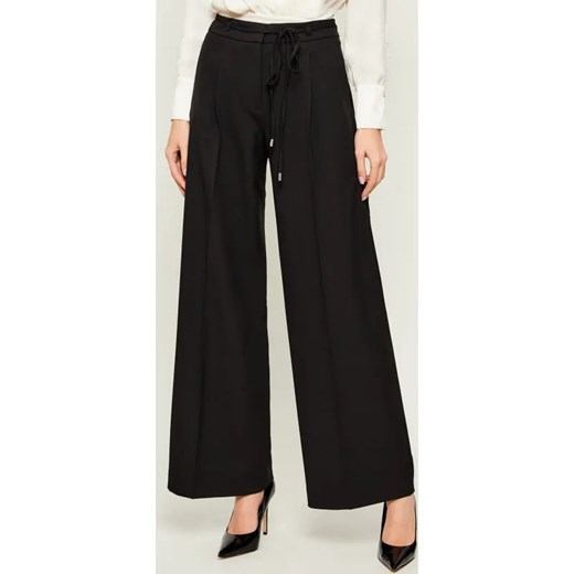 HUGO Spodnie Haminde | flare fit ze sklepu Gomez Fashion Store w kategorii Spodnie damskie - zdjęcie 187545137