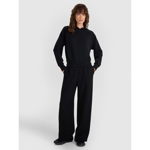 Damskie spodnie dresowe 4F 4FWAW25TTROF1181 - czarne ze sklepu Sportstylestory.com w kategorii Spodnie damskie - zdjęcie 187549837