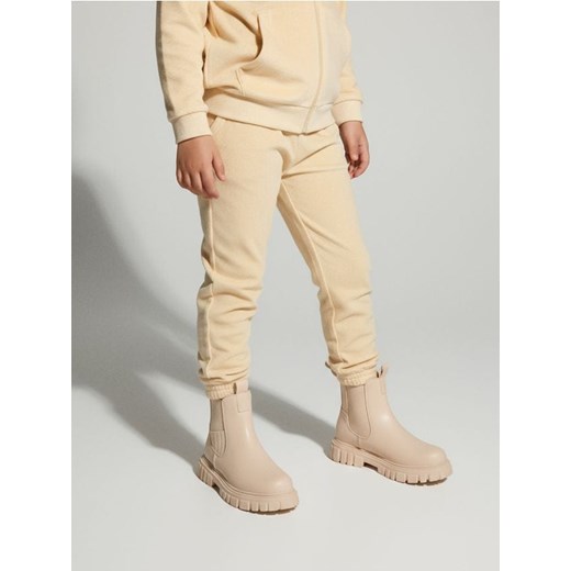Sinsay - Spodnie jogger z połyskiem - beżowy ze sklepu Sinsay w kategorii Spodnie chłopięce - zdjęcie 187559487