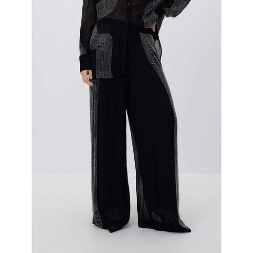 Reserved - Spodnie z wiskozy z aplikacją - czarny ze sklepu Reserved w kategorii Spodnie damskie - zdjęcie 187578647