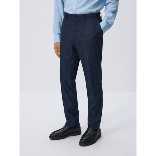 Reserved - Spodnie garniturowe slim fit - granatowy ze sklepu Reserved w kategorii Spodnie męskie - zdjęcie 187580159