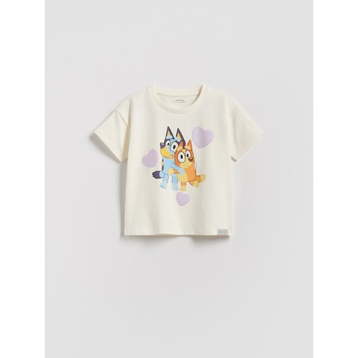 Reserved - Bawełniany t-shirt Bluey - złamana biel ze sklepu Reserved w kategorii Bluzki dziewczęce - zdjęcie 187583479