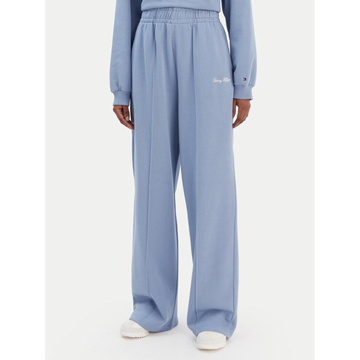 Tommy Hilfiger Spodnie dresowe Script WW0WW48784 Niebieski Relaxed Fit ze sklepu MODIVO w kategorii Spodnie damskie - zdjęcie 187585338