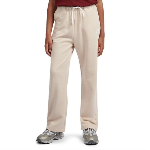 Spodnie dziecięce New Balance LAKG0216BIS - beżowe ze sklepu streetstyle24.pl w kategorii Spodnie dziewczęce - zdjęcie 187587416