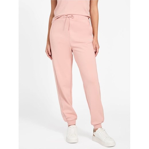 Guess Spodnie materiałowe 179778 Różowy Slim Fit ze sklepu MODIVO w kategorii Spodnie damskie - zdjęcie 187598479