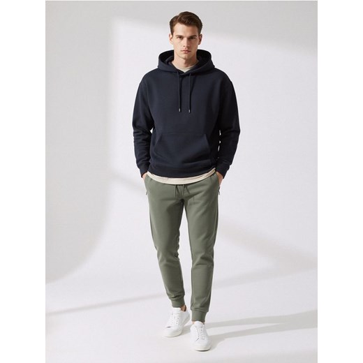Sinsay - Spodnie dresowe jogger - zielony ze sklepu Sinsay w kategorii Spodnie męskie - zdjęcie 187615315