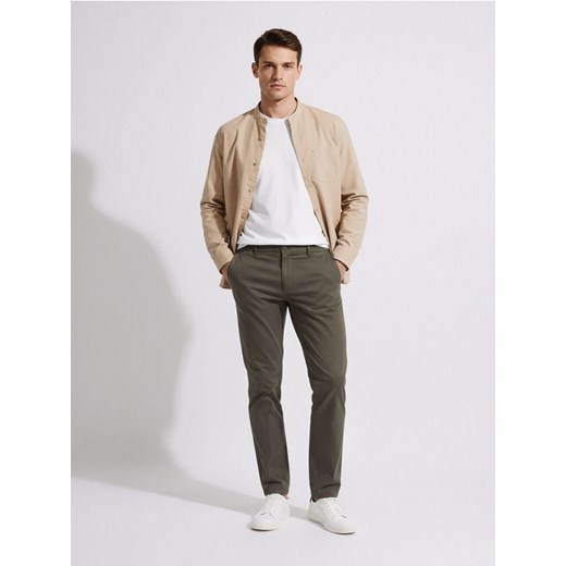 Sinsay - Spodnie chino slim - zielony ze sklepu Sinsay w kategorii Spodnie męskie - zdjęcie 187615348
