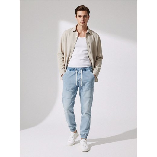 Sinsay - Spodnie jogger - niebieski ze sklepu Sinsay w kategorii Jeansy męskie - zdjęcie 187615405