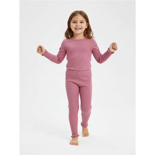 Sinsay - Prążkowane legginsy z wykończeniem falbankowym - różowy ze sklepu Sinsay w kategorii Spodnie dziewczęce - zdjęcie 187615549