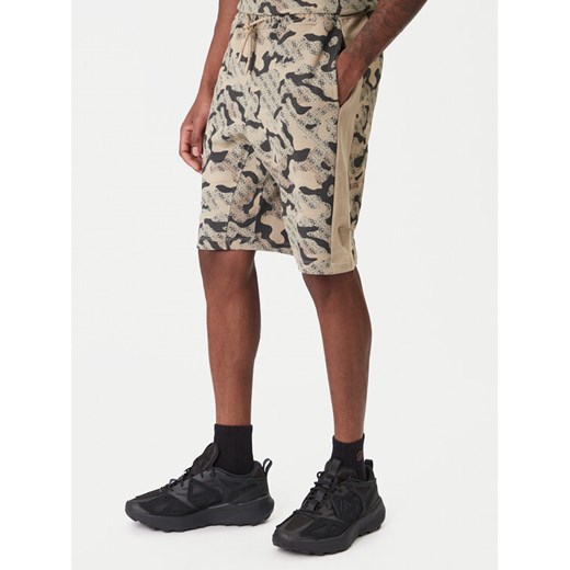 Guess Szorty sportowe Z6RD00 K9YI1 Beżowy Regular Fit ze sklepu MODIVO w kategorii Spodenki męskie - zdjęcie 187622679