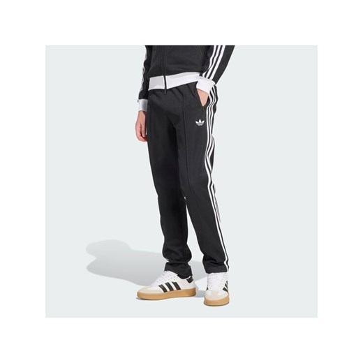 adidas Spodnie dresowe Classic KE3530 Czarny Slim Fit ze sklepu MODIVO w kategorii Spodnie męskie - zdjęcie 187646426