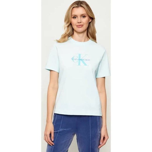 Calvin Klein Jeans T-shirt HERO | Regular Fit ze sklepu Gomez Fashion Store w kategorii Bluzki damskie - zdjęcie 187667937