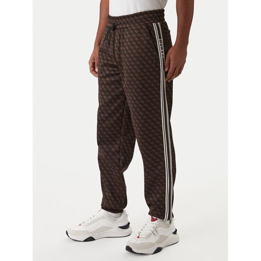 Guess Spodnie dresowe Z5BB19 K2042 Czarny Regular Fit ze sklepu MODIVO w kategorii Spodnie męskie - zdjęcie 187681075