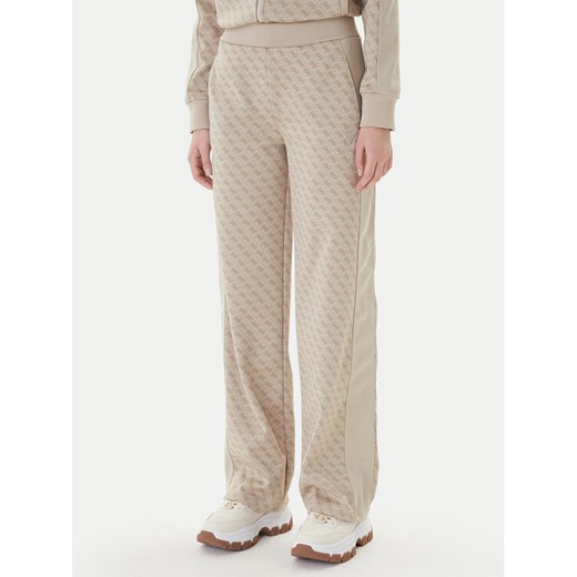 Guess Spodnie dresowe V6RB09 K2042 Beżowy Wide Leg ze sklepu MODIVO w kategorii Spodnie damskie - zdjęcie 187681077