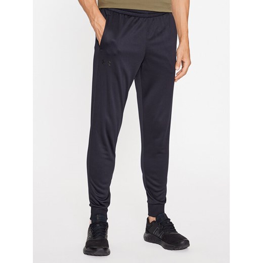 Under Armour Spodnie dresowe Ua Armour Fleece Joggers 1373362 Czarny Loose Fit ze sklepu MODIVO w kategorii Spodnie męskie - zdjęcie 187766745