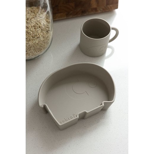 Sebra Silikonowy kubek &quot;Mums&quot; w kolorze beżowym - 4 m+ Sebra onesize wyprzedaż Limango Polska