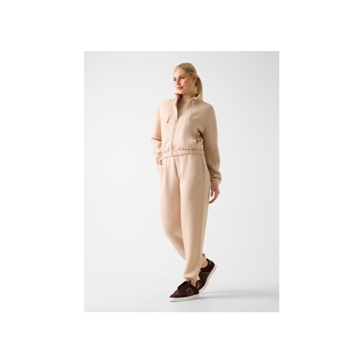 Guess Spodnie materiałowe 169841 Beżowy Slim Fit Guess XXS MODIVO