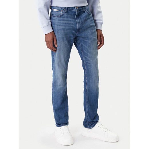 Calvin Klein Jeans Jeansy LV04RE784G Niebieski Skinny Fit ze sklepu MODIVO w kategorii Jeansy męskie - zdjęcie 187857568