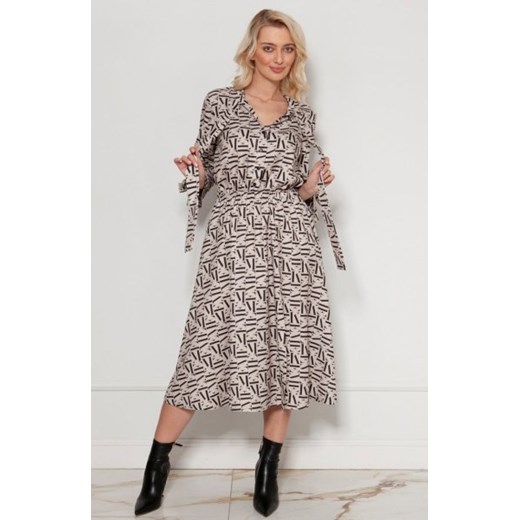 Sukienka z wiązaniem na dekolcie i rękawach literki SUK209 ze sklepu intimiti.pl w kategorii Sukienki - zdjęcie 187860358