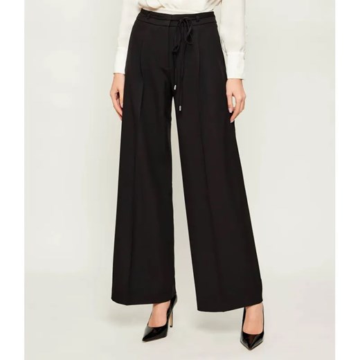 HUGO Spodnie Haminde | flare fit ze sklepu Gomez Fashion Store w kategorii Spodnie damskie - zdjęcie 187926728