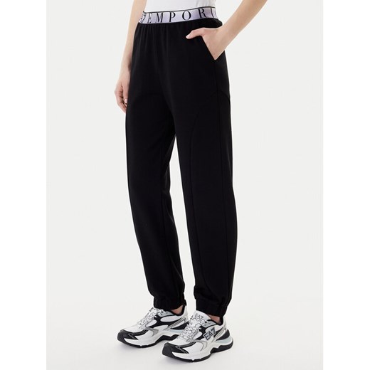 EA7 Emporio Armani Spodnie dresowe 7W001154 AF12501 UC001 Czarny Regular Fit ze sklepu MODIVO w kategorii Spodnie damskie - zdjęcie 187934239