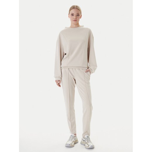 EA7 Emporio Armani Dres 7W000194 AF12643 U1088 Beżowy Relaxed Fit ze sklepu MODIVO w kategorii Dresy damskie - zdjęcie 187946996