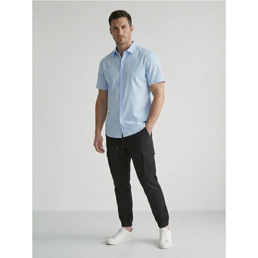 Sinsay - Spodnie jogger cargo ze wzorem moro - czarny ze sklepu Sinsay w kategorii Spodnie męskie - zdjęcie 187966108