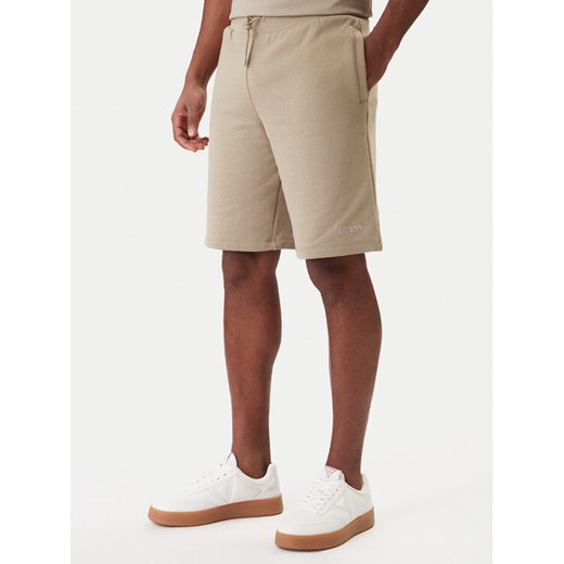Guess Szorty sportowe Z6RD06 KAIJ1 Beżowy Regular Fit ze sklepu MODIVO w kategorii Spodenki męskie - zdjęcie 187976169