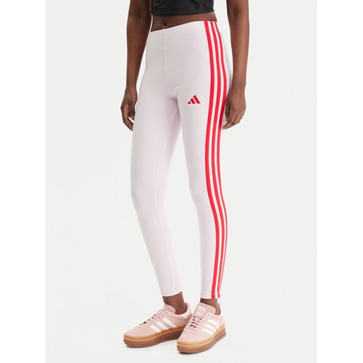 adidas Legginsy Essentials 3-Stripes KC5180 Różowy Slim Fit ze sklepu MODIVO w kategorii Spodnie damskie - zdjęcie 188007678
