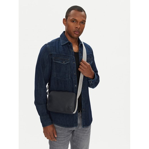 Calvin Klein Jeans Saszetka Cargo Camera Bag LV04G3081G Niebieski ze sklepu MODIVO w kategorii Torby męskie - zdjęcie 188256518