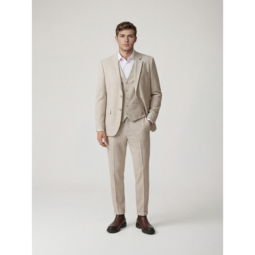 Reserved - Garniturowe spodnie w kant - beżowy Reserved 52 Reserved