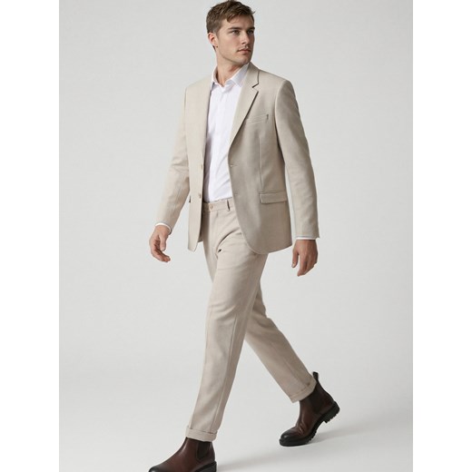 Reserved - Garniturowe spodnie w kant - beżowy Reserved 56 Reserved