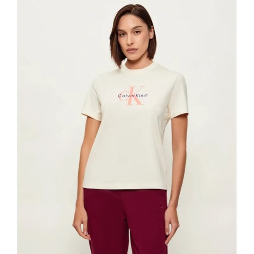 Calvin Klein Jeans T-shirt HERO | Regular Fit ze sklepu Gomez Fashion Store w kategorii Bluzki damskie - zdjęcie 188443807
