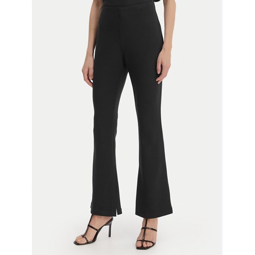 Calvin Klein Spodnie materiałowe LV044B223G Czarny Flare Fit ze sklepu MODIVO w kategorii Spodnie damskie - zdjęcie 189368886