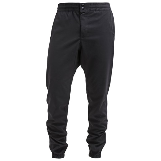 Nike Sportswear Spodnie materiałowe black zalando czarny abstrakcyjne wzory