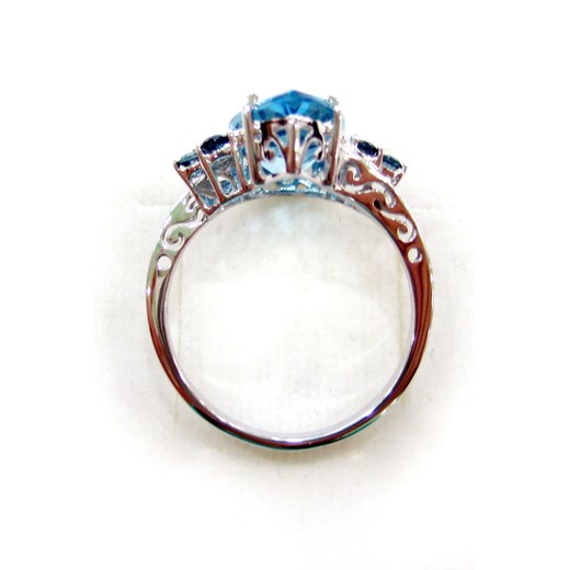 PIERŚCIONEK BŁĘKITNY PTAK ;  Złoty Pierścionek z blue topazem i diamentami bialy Braccatta 17  okazyjna cena 