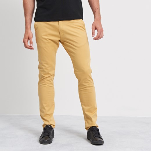 Reserved - Spodnie slim fit - Żółty