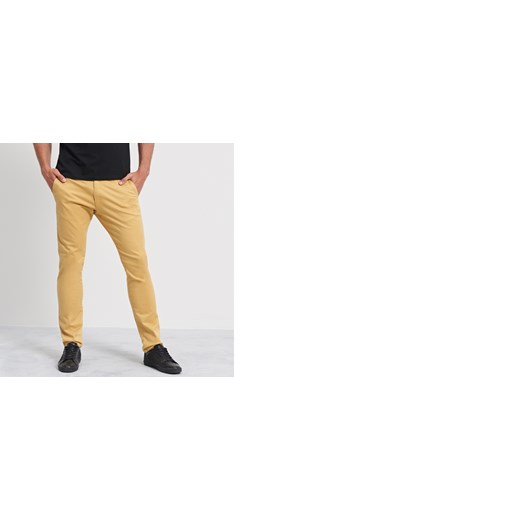 Reserved - Spodnie slim fit - Żółty