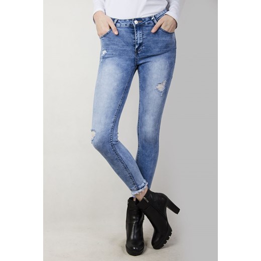 Spodnie jeansowe przylegające, z szarpaniami przy nogawce niebieski  S olika.com.pl