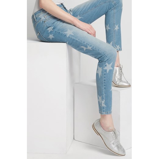 Jeansy skinny z laserowym printem niebieski Orsay 32 orsay.com
