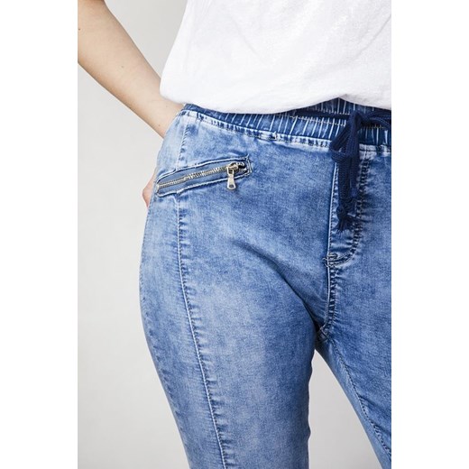 Spodnie jeansowe z zamkami i ściągaczami