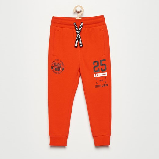 Reserved - Spodnie dresowe - Pomarańczo pomaranczowy Reserved 116 