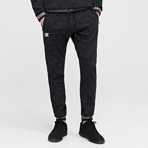 Cropp - Spodnie dresowe z geometrycznym wzorem - Czarny