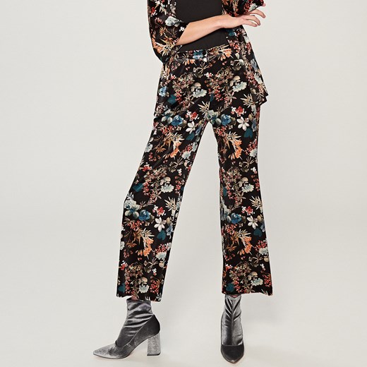 Reserved - Welurowe spodnie w kwiaty - Wielobarwn