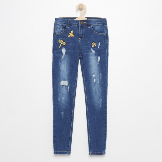 Reserved - Spodnie jeansowe z naszywkami - Niebieski Reserved niebieski 146 