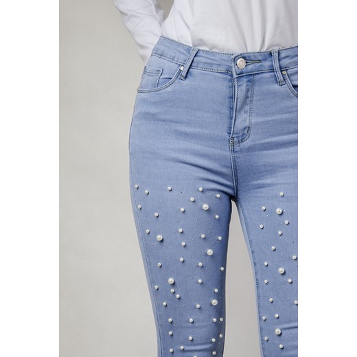 Jasne spodnie jeansowe z koralikami oraz cyrkoniami  niebieski XL olika.com.pl