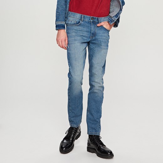 Reserved - Jeansowe spodnie z przetarciami - Niebieski niebieski Reserved 32 